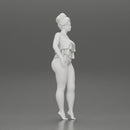 Sexy girl in bikini standing with her friend on the beach - Only-Games