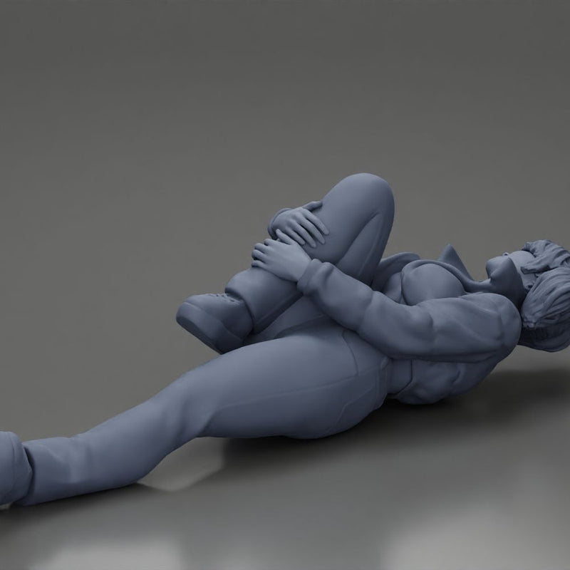 woman in mini jacket  lying on the floor touching her injured knee - Only-Games