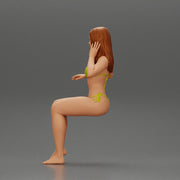Sexy girl in a bikini sitting on a boat - Only-Games