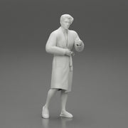 man in bathrobe standing - Only-Games