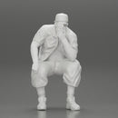 Fat Gangster in cap and sunglasses sitting and thinking - Only-Games