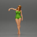 Sexy girl in onepiece standing with her friend on the beach - Only-Games