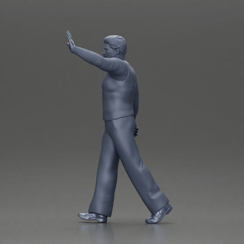 man in suit raising hand up walking