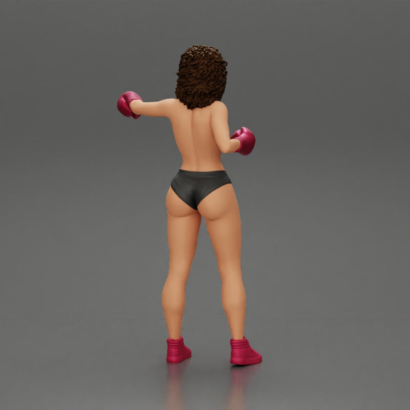 black naked breasts woman in boxing gloves with curly hair ready to finish off her opponent - Only-Games