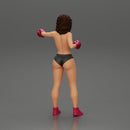 black naked breasts woman in boxing gloves with curly hair ready to finish off her opponent - Only-Games