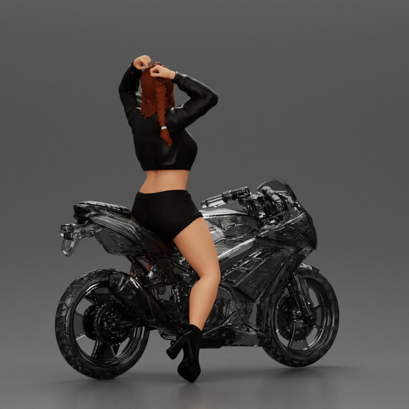 attractive girl on the motorbike stopping and putting hands on hair