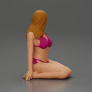 Beautiful Woman in Bikini Sitting on the Beach - Only-Games