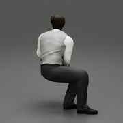 young businessman sitting and holding briefcase of money - Only-Games