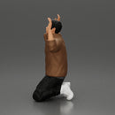 Asian gangster man in jacket sitting with his hands up ready to be arrested - Only-Games