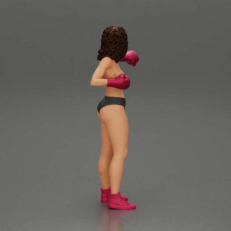 black naked breasts woman in boxing gloves with curly hair ready to finish off her opponent - Only-Games