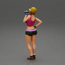 Sexy girl mechanic drinks water during a break - Only-Games