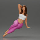 Fit girl in leggings sitting on a sofa - Only-Games