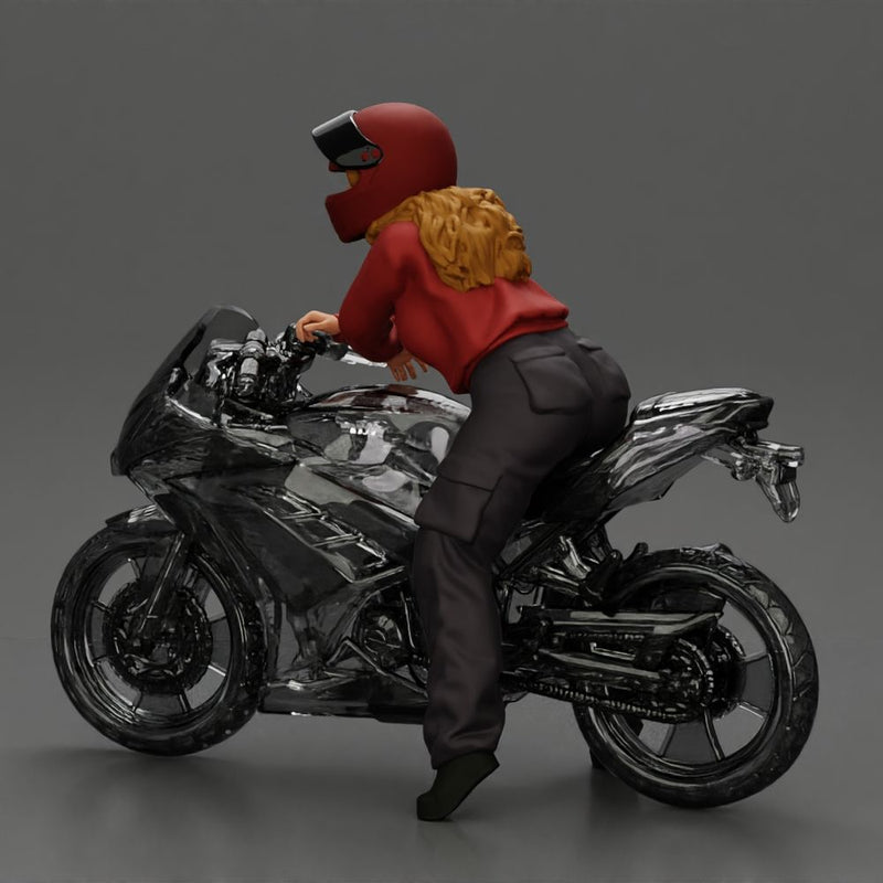 motorcyclist woman in helmet and hoodie sitting on motorcycle