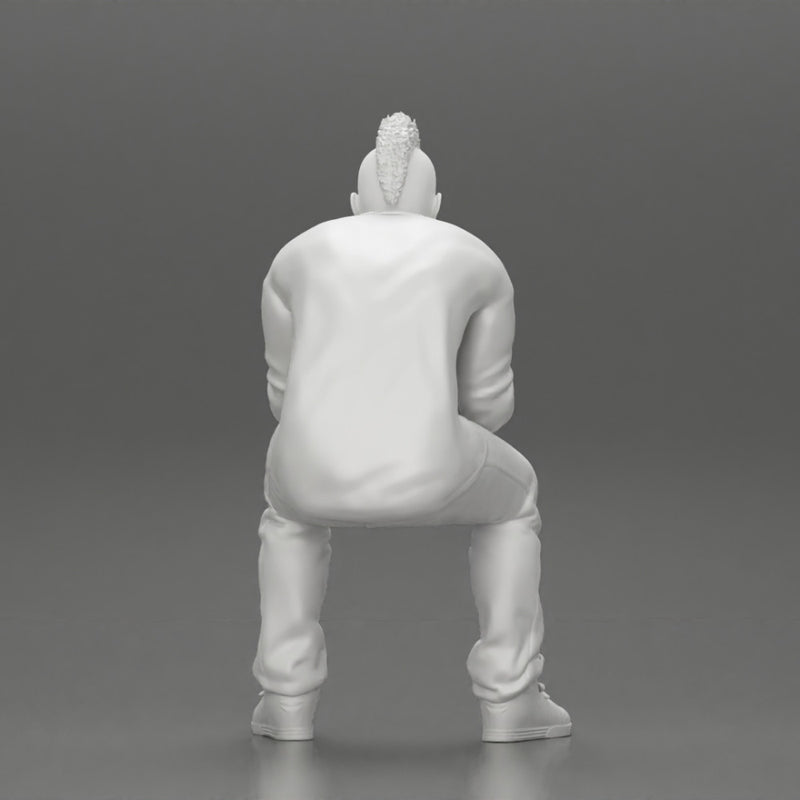metal man sitting and contemplating with a satanic haircut - Only-Games