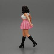 2 Young woman in sexy dress and boots pulling suitcase  walking in airport terminal - Only-Games