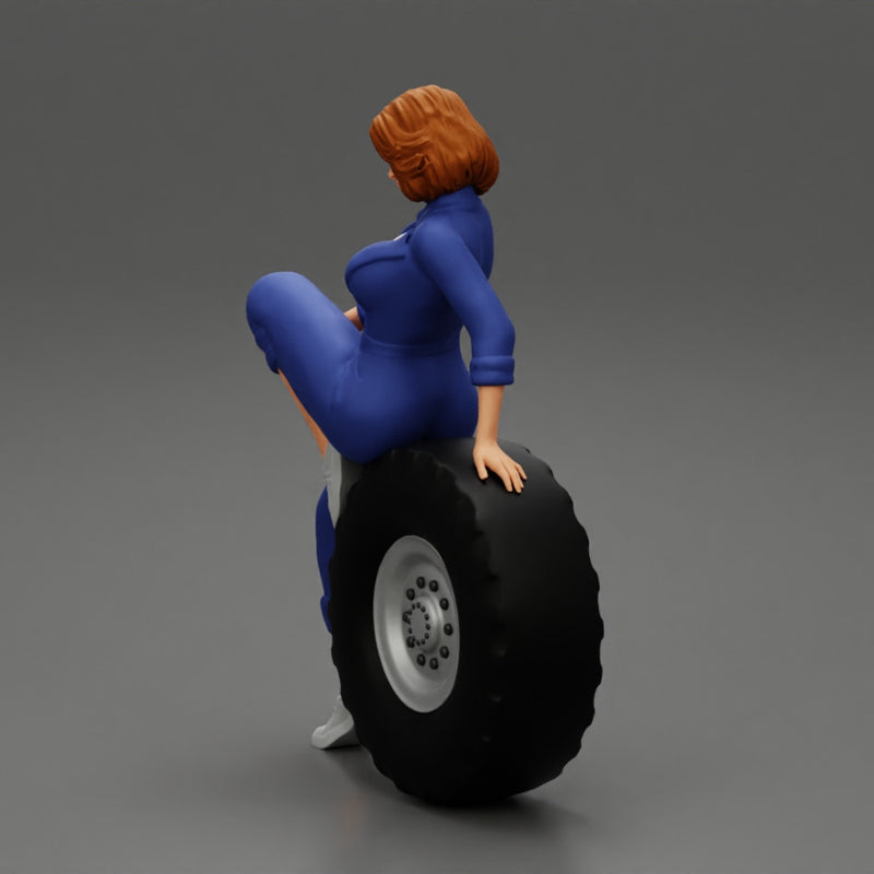 2 Models - Sexy girl mechanic in suit sitting on a truck tyre 2 - Only-Games