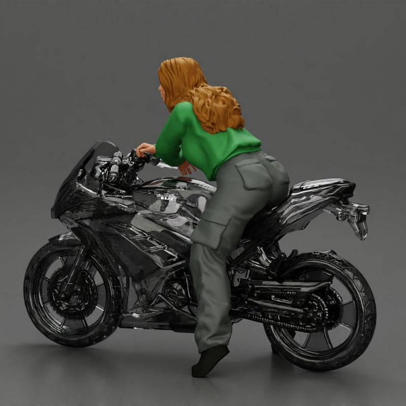 motorcyclist woman hoodie sitting on motorcycle