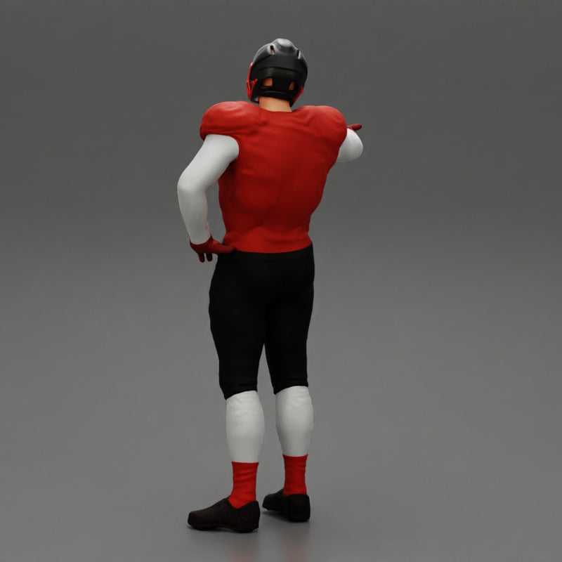Rugby player standing pointing to the ball - Only-Games