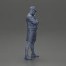 Confident man posing with folded arms, exuding a casual vibe - Only-Games