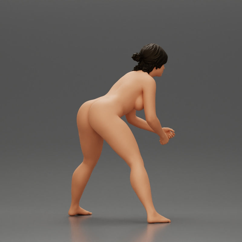 Naked tennis player holding her racket in a ready position - Only-Games