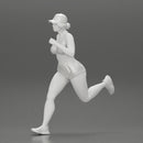young woman running in shorts and cap - Only-Games
