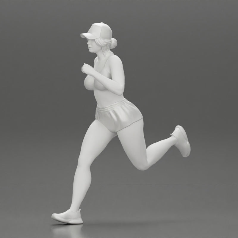 young woman running in shorts and cap