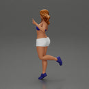 happy girl in a bra  and shorts, jumping on one leg - Only-Games