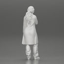 beautiful girl in large jeans and a long coat thinking - Only-Games