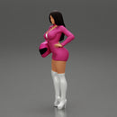 Sexy motorcyclist woman holding helmet - Only-Games