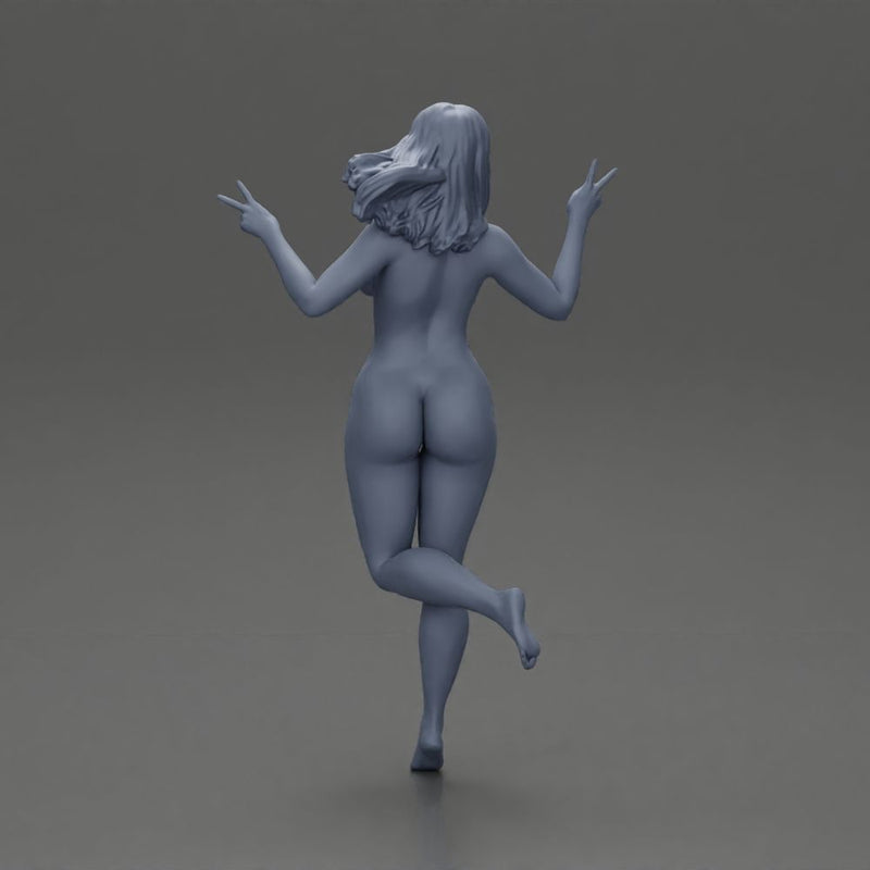 Naked happy girl jumping on one leg