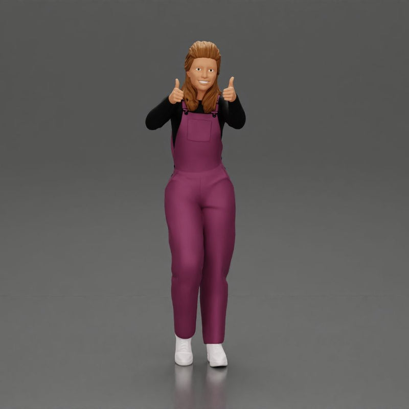 Smiling girl in overalls showing a thumbs up with both hands - Only-Games