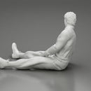 Accident of a male worker sitting on the floor with an injured - Only-Games