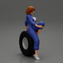 2 Models - Sexy girl mechanic in suit sitting on a truck tyre 2 - Only-Games