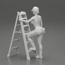 Young girl in helmet mechanic climbing the ladder - Only-Games