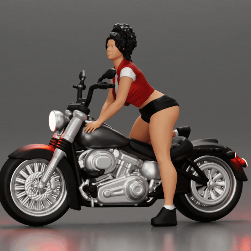 attractive girl on the motorbike in shorts and a mini jacket with curly hair