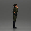 policewoman standing hand resting on her back speaking into a radio with short hair - Only-Games