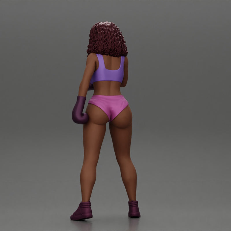 Black girl with curly hair boxing winning and screaming at the losing girl