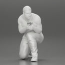 Gangster in pants sitting and holding a gun hides behind the car - Only-Games