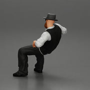 gagnster homie in beard and hat sitting holding lighter cigar while smoking - Only-Games