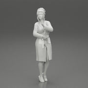 woman in a white bathrobe standing - Only-Games