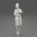 woman in a white bathrobe standing - Only-Games