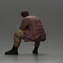 Thoughtful Man Squatting in Casual Outfit, Deep in Contemplation - Only-Games