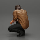 man sitting on the sidewalk and petting his dog - Only-Games