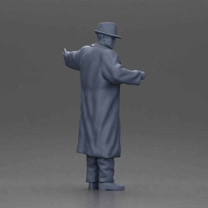 mafia man in gangster costume stands confidently while gesturing with his hands as if presenting something