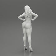 Sexy girl in short and heels with long hair posing - Only-Games