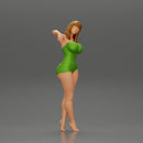 Sexy girl in onepiece standing with her friend on the beach - Only-Games