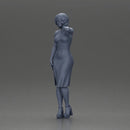 beautiful girl in a mini dress and heels with short hair places her hand on her neck - Only-Games