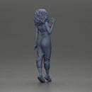 Curly-Haired Woman in Vibrant Green Outfit Striking a Pose - Only-Games