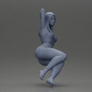 Fit girl in leggings sitting on a sofa - Only-Games