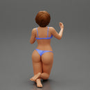 Sexy girl in bikini with short hair sitting on her knees - Only-Games